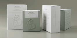 Rendering of four boxes of specialty coffee on a glossy green background